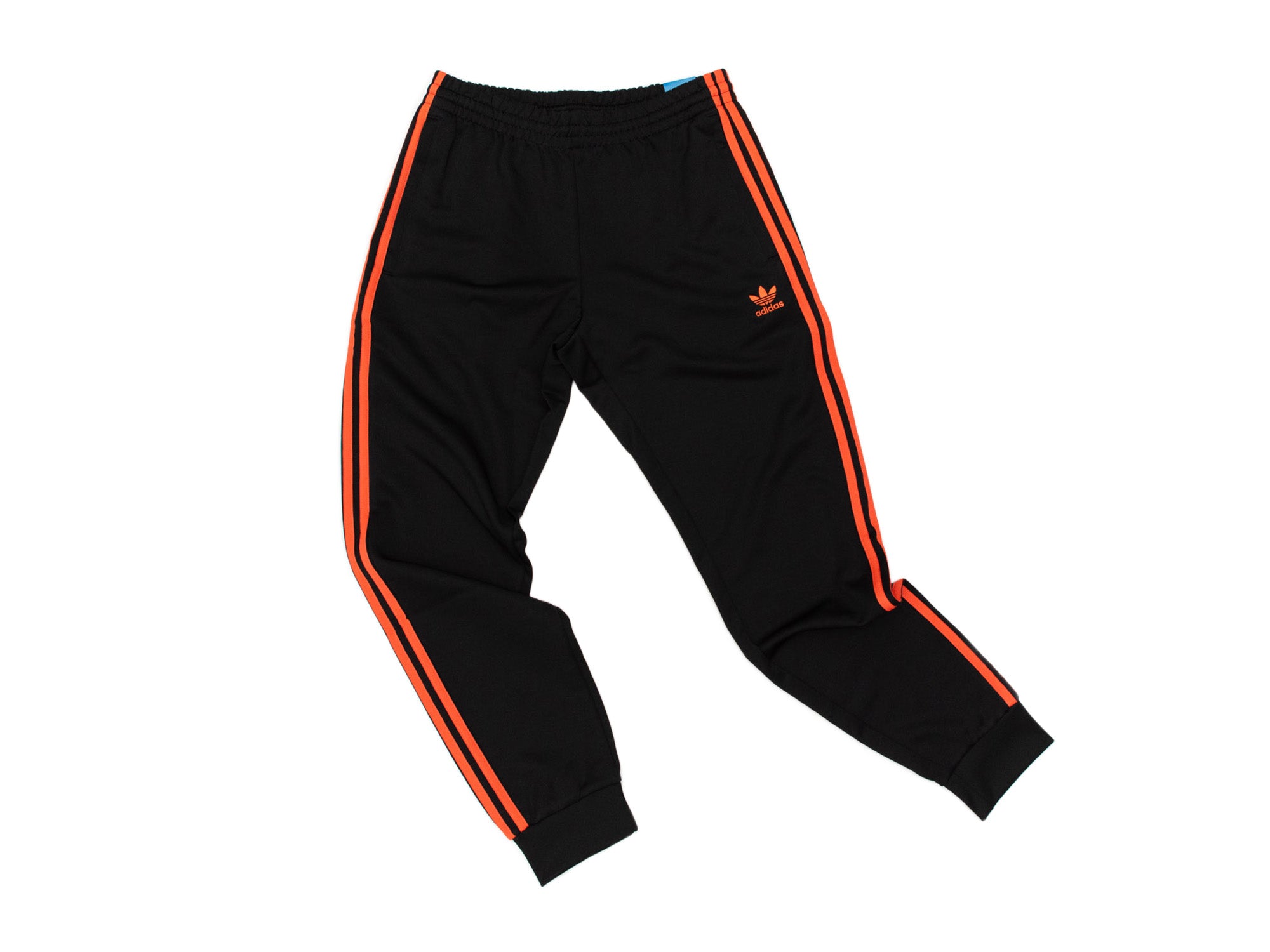 Black adidas pants 2024 with orange stripes